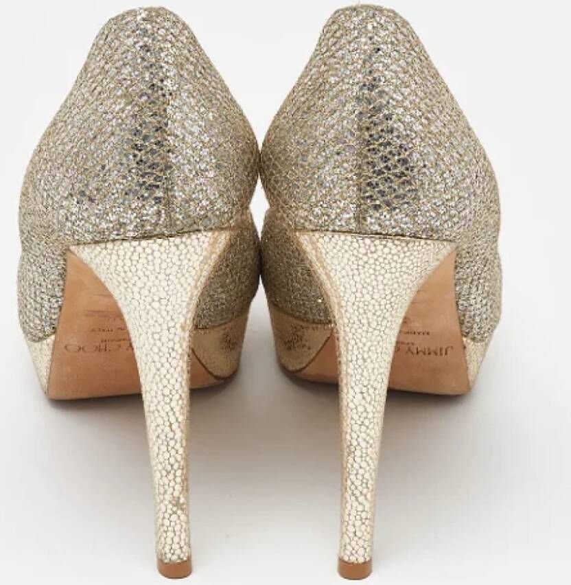 Jimmy Choo Pre-owned Fabric heels Yellow Dames