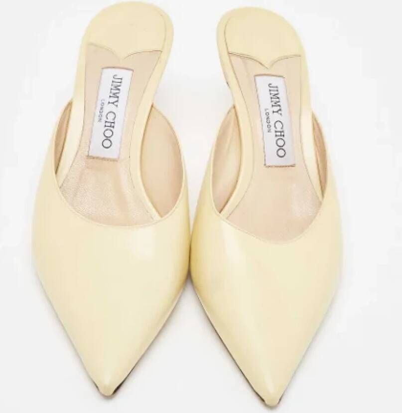 Jimmy Choo Pre-owned Leather mules Yellow Dames