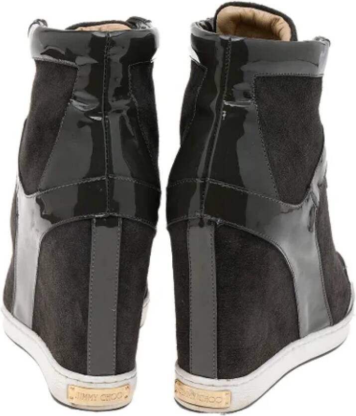 Jimmy Choo Pre-owned Leather sneakers Gray Dames