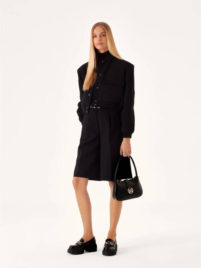 Kazar Zwarte platte schoenen met een ketting op een lug zool Black Dames