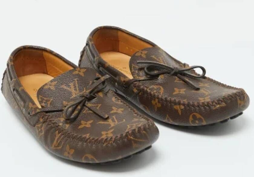 Louis Vuitton Vintage Pre-owned Coated canvas flats Brown Heren