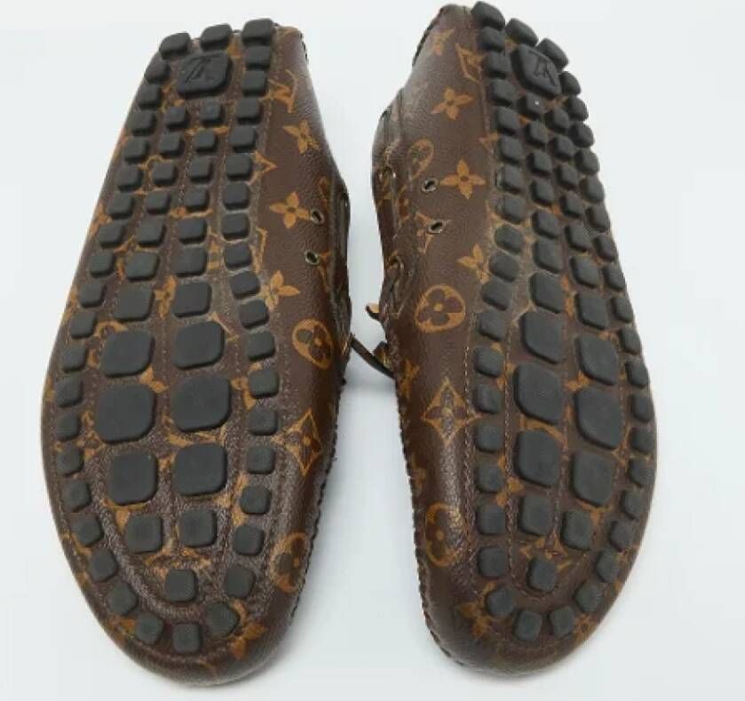 Louis Vuitton Vintage Pre-owned Coated canvas flats Brown Heren