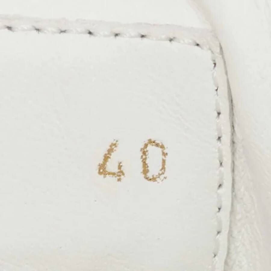 Louis Vuitton Vintage Pre-owned Coated canvas sneakers Beige Dames