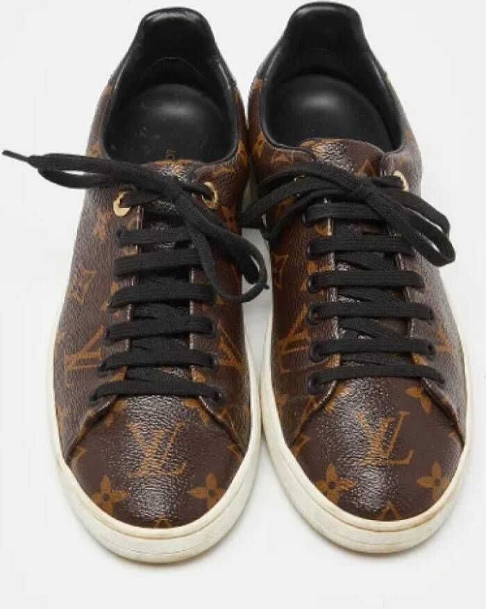 Louis Vuitton Vintage Pre-owned Coated canvas sneakers Brown Dames