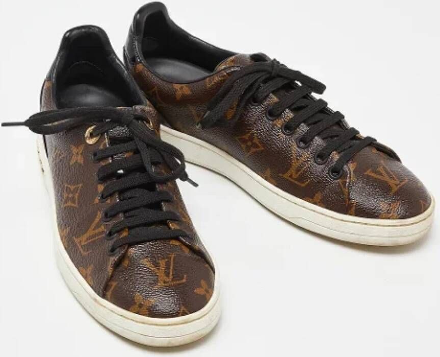 Louis Vuitton Vintage Pre-owned Coated canvas sneakers Brown Dames