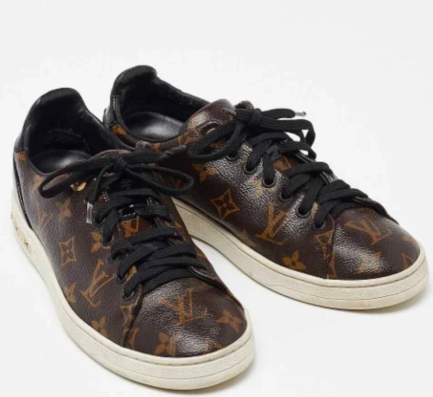 Louis Vuitton Vintage Pre-owned Coated canvas sneakers Brown Dames