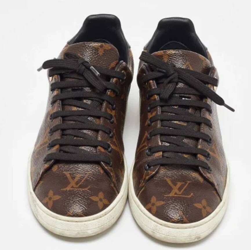 Louis Vuitton Vintage Pre-owned Coated canvas sneakers Brown Dames