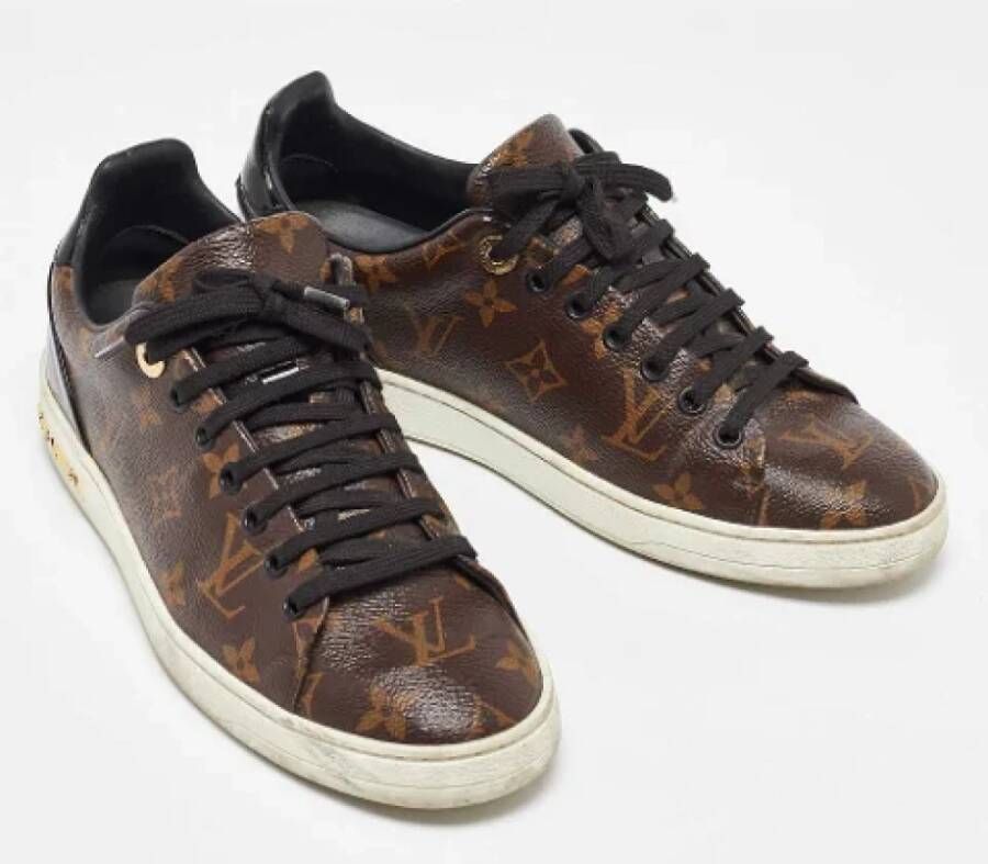 Louis Vuitton Vintage Pre-owned Coated canvas sneakers Brown Dames