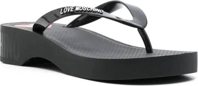 Love Moschino Zwarte rubberen slippers met logo print Zwart Dames