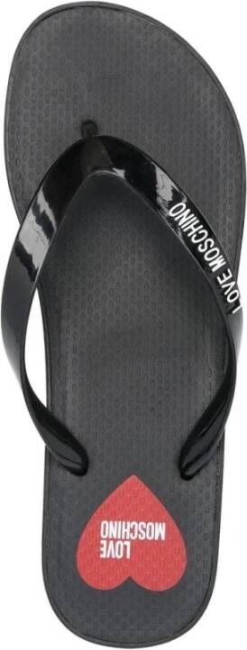 Love Moschino Zwarte rubberen slippers met logo print Zwart Dames