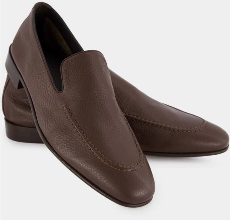Manolo Blahnik Bruine leren loafers met zwarte rand