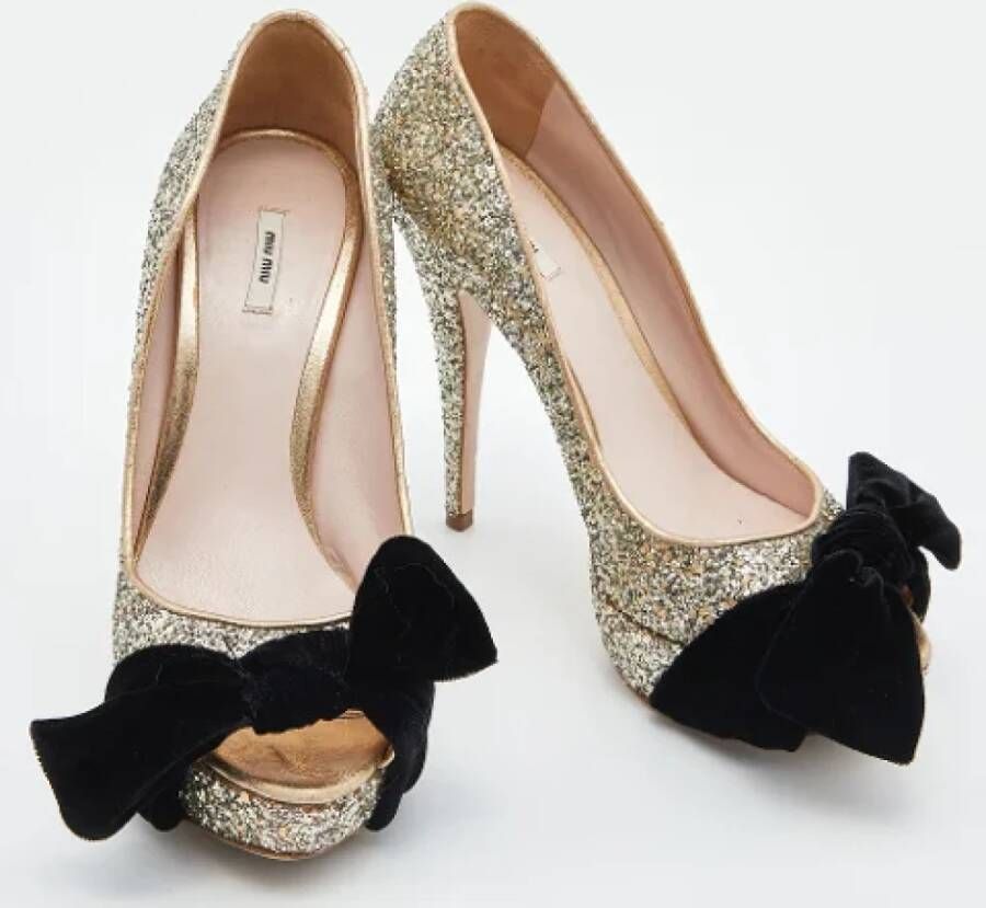 Miu Pre-owned Fabric heels Yellow Dames