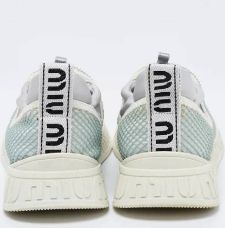 Miu Pre-owned Fabric sneakers Gray Dames