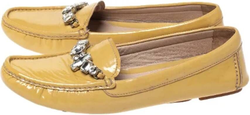 Miu Pre-owned Leather flats Yellow Dames