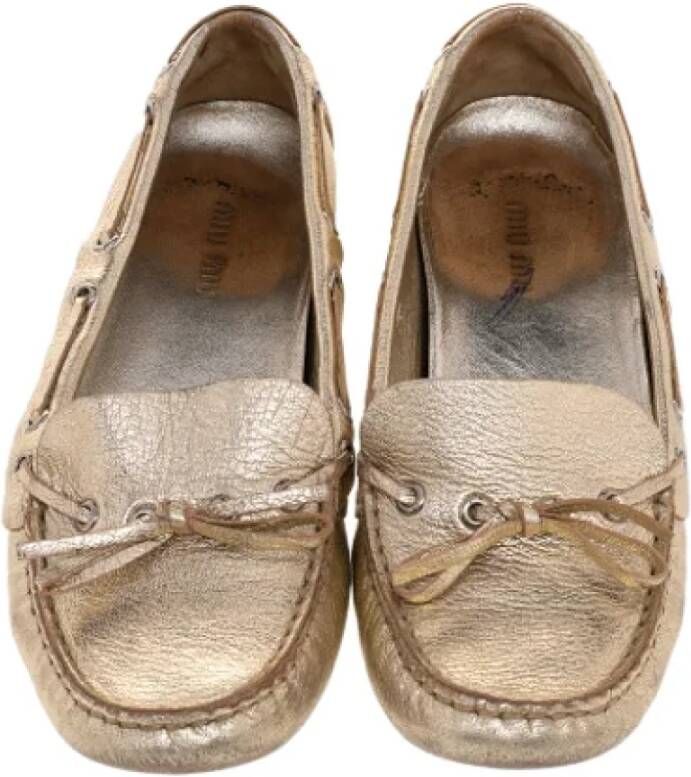 Miu Pre-owned Leather flats Yellow Dames