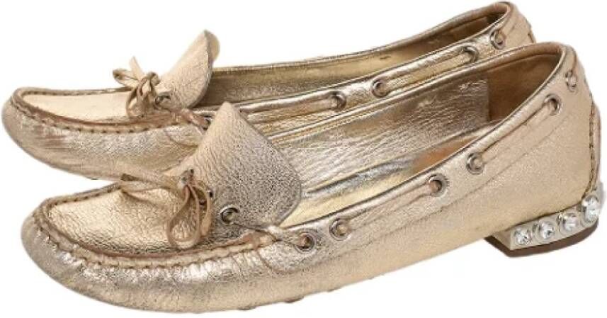 Miu Pre-owned Leather flats Yellow Dames