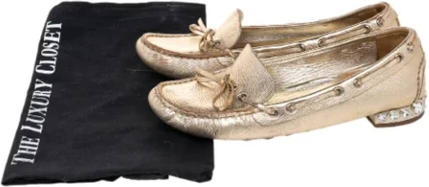 Miu Pre-owned Leather flats Yellow Dames