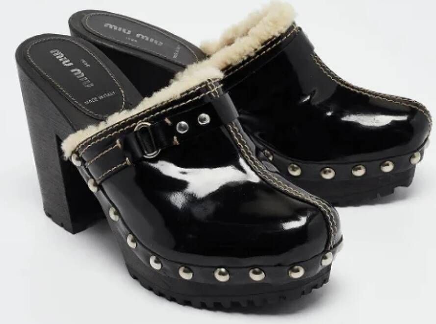 Miu Pre-owned Leather mules Black Dames