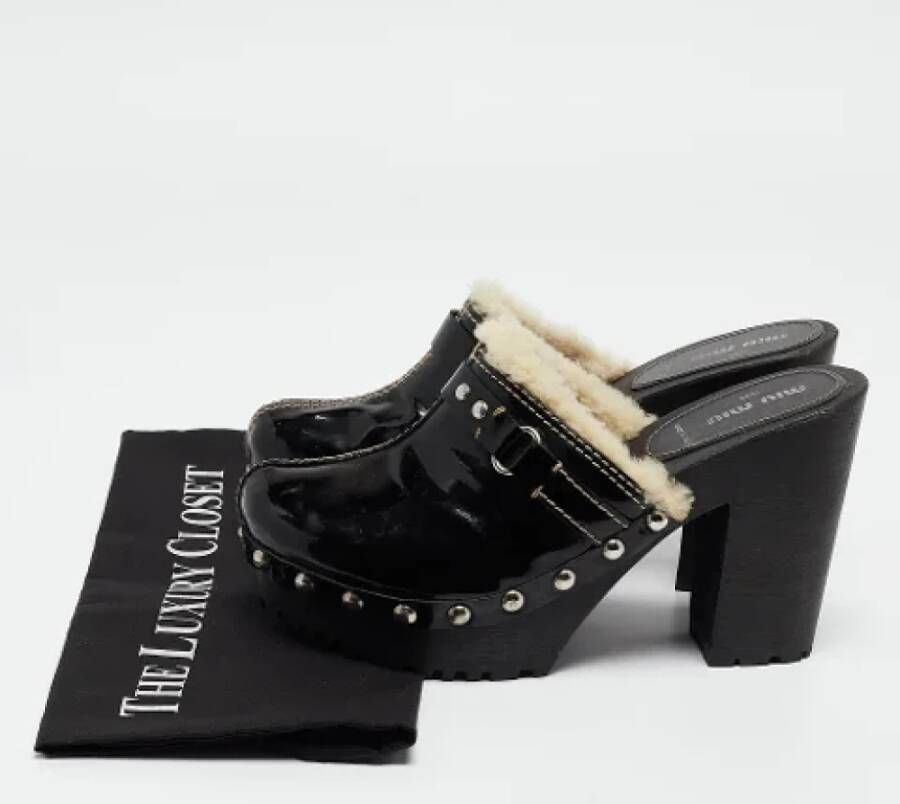 Miu Pre-owned Leather mules Black Dames