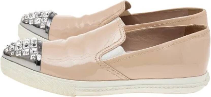 Miu Pre-owned Leather sneakers Beige Dames