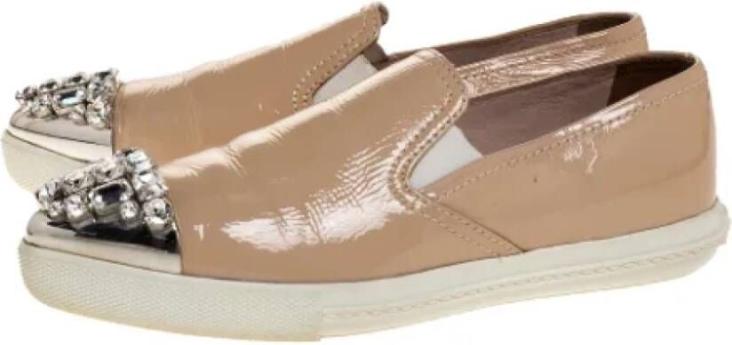 Miu Pre-owned Leather sneakers Beige Dames