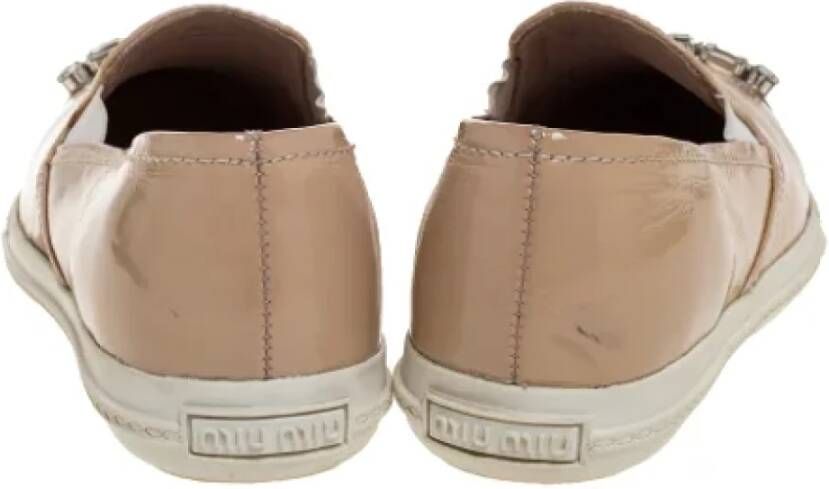 Miu Pre-owned Leather sneakers Beige Dames