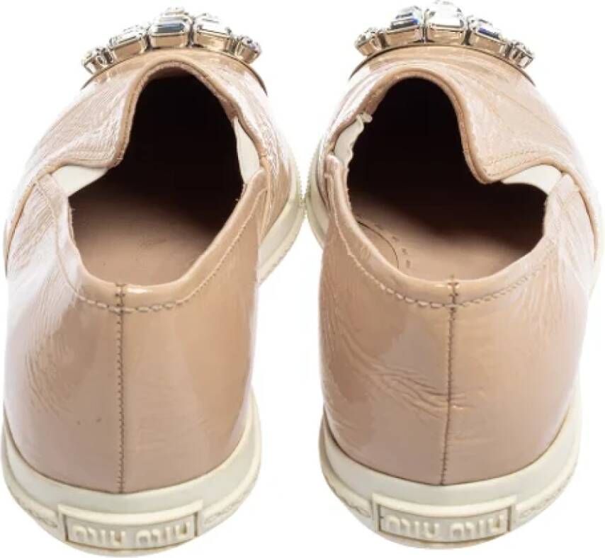 Miu Pre-owned Leather sneakers Beige Dames