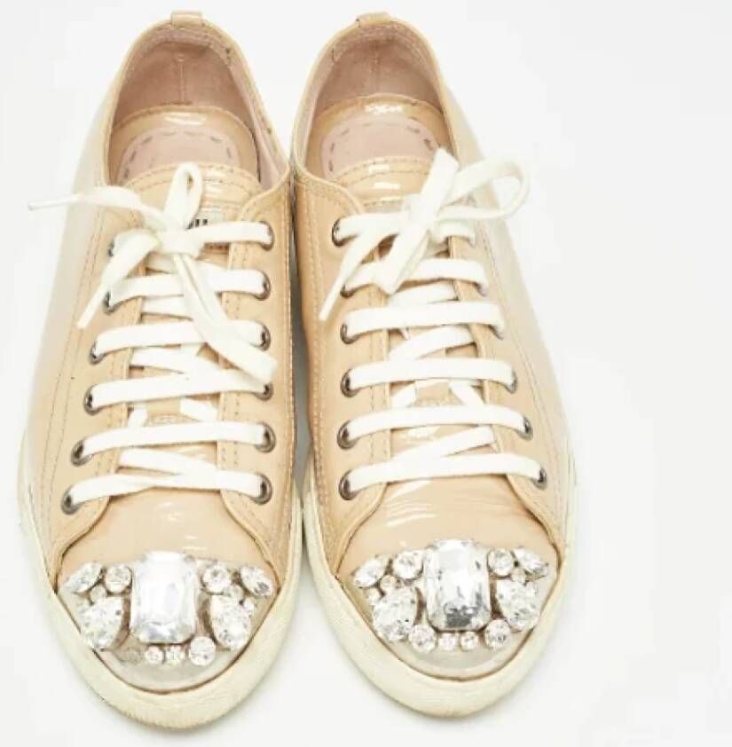 Miu Pre-owned Leather sneakers Beige Dames