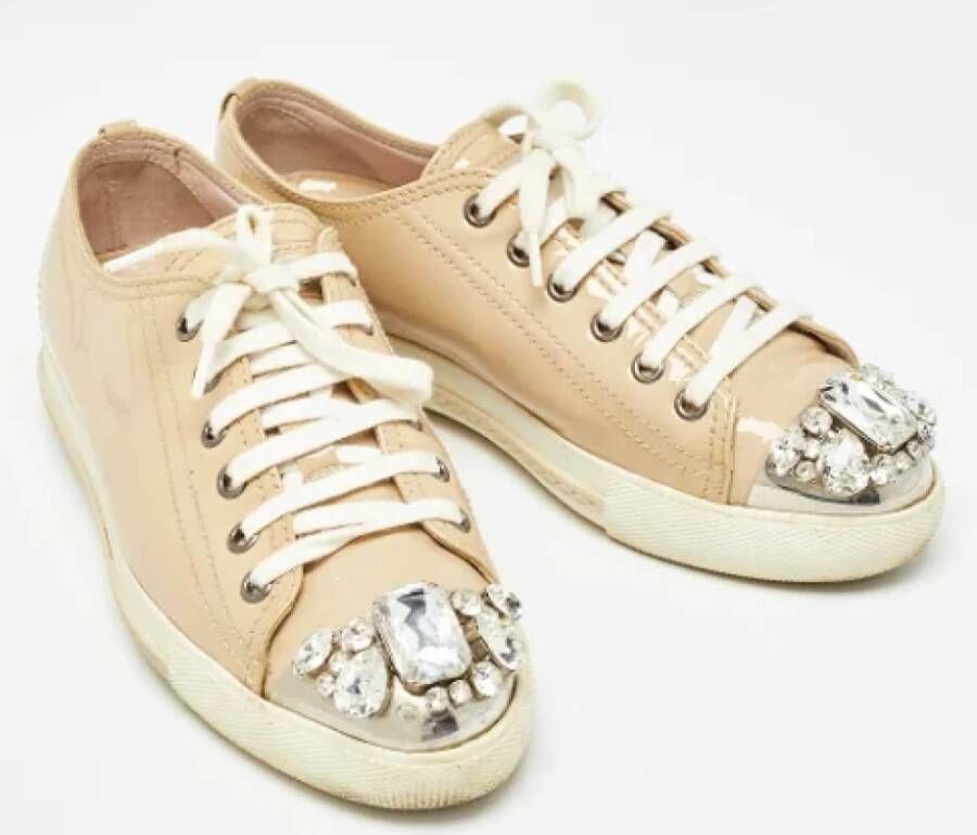 Miu Pre-owned Leather sneakers Beige Dames