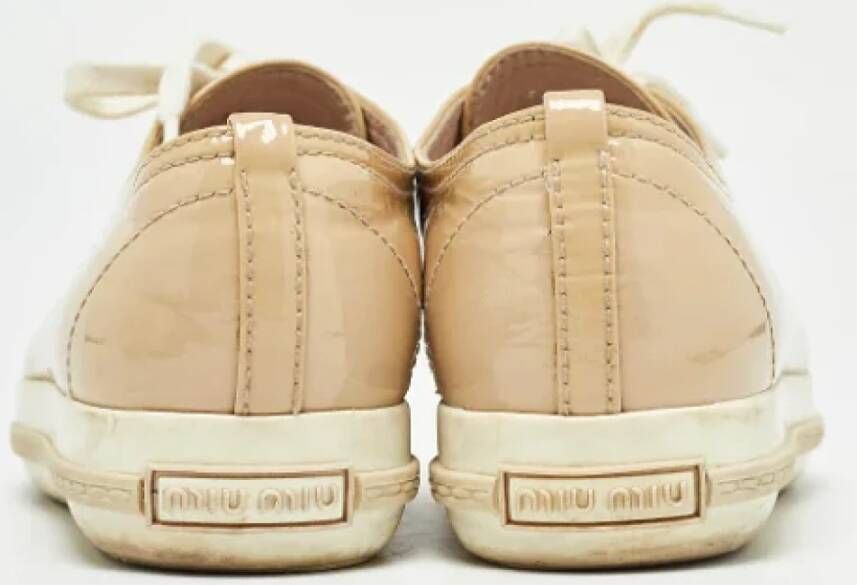 Miu Pre-owned Leather sneakers Beige Dames