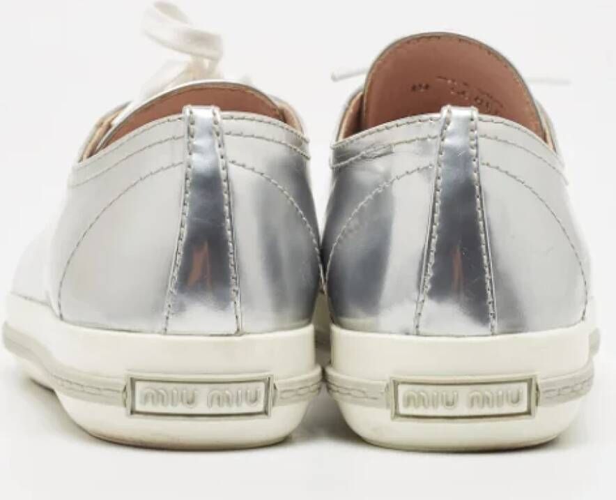 Miu Pre-owned Leather sneakers Gray Dames