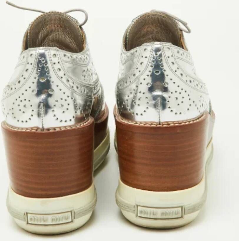 Miu Pre-owned Leather sneakers Gray Dames