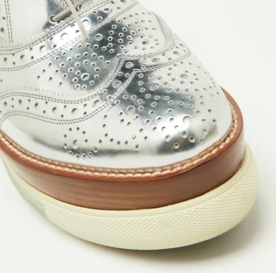 Miu Pre-owned Leather sneakers Gray Dames