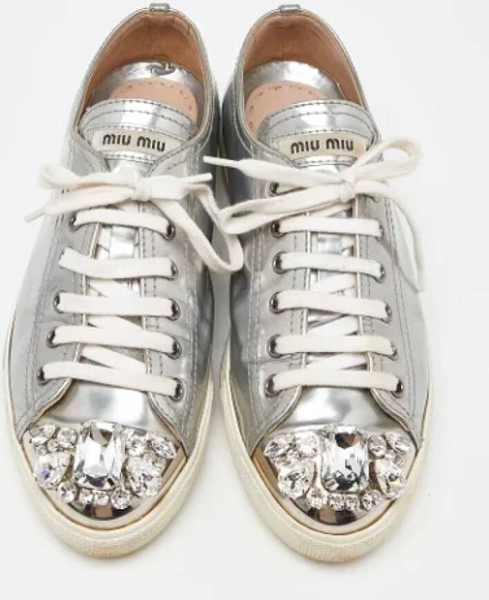 Miu Pre-owned Leather sneakers Gray Dames