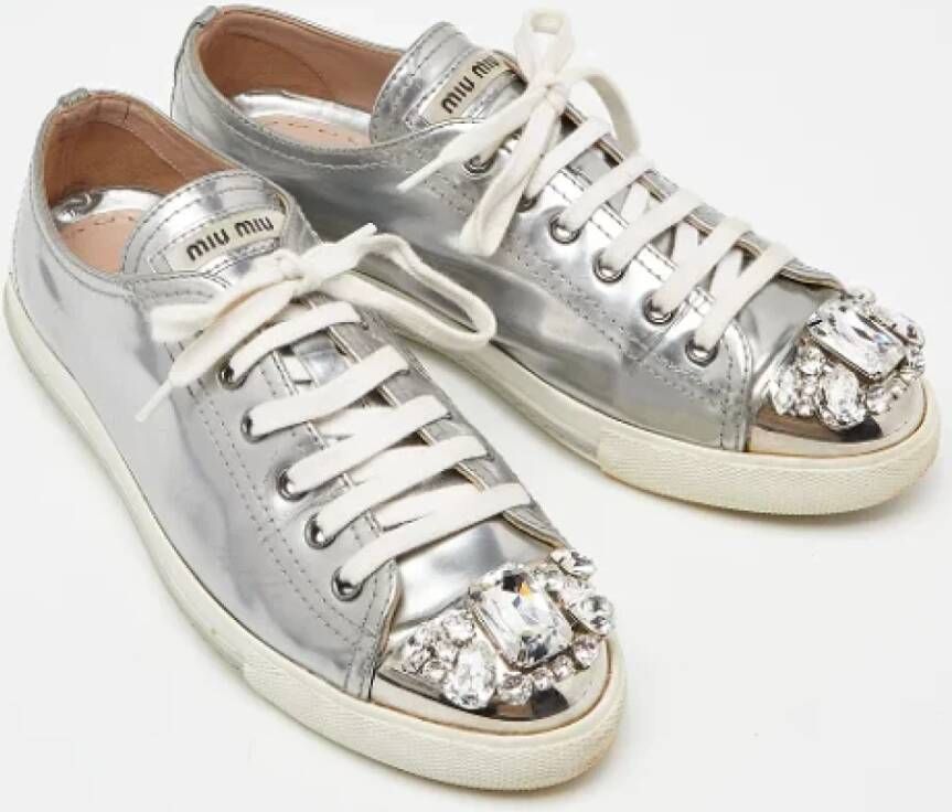 Miu Pre-owned Leather sneakers Gray Dames