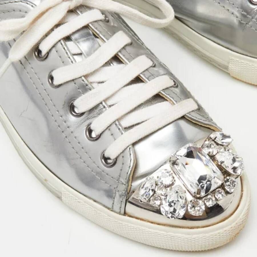 Miu Pre-owned Leather sneakers Gray Dames