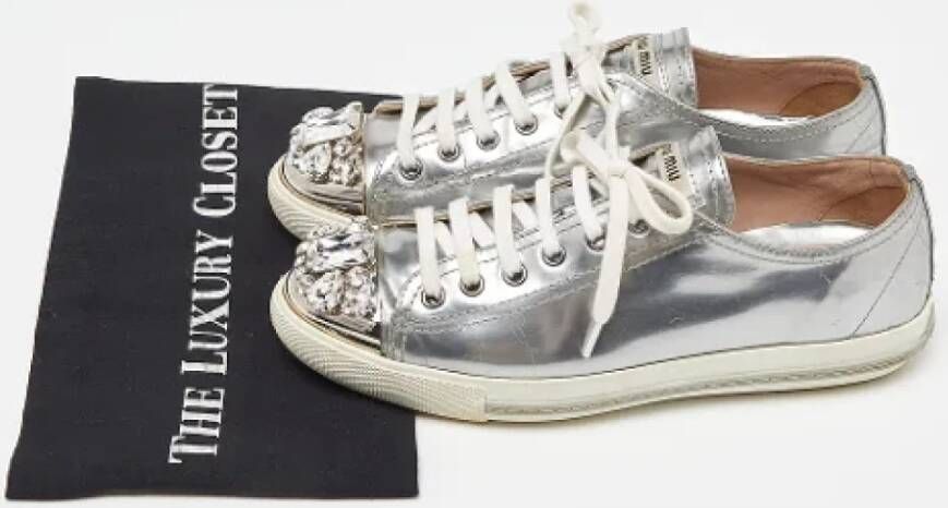 Miu Pre-owned Leather sneakers Gray Dames