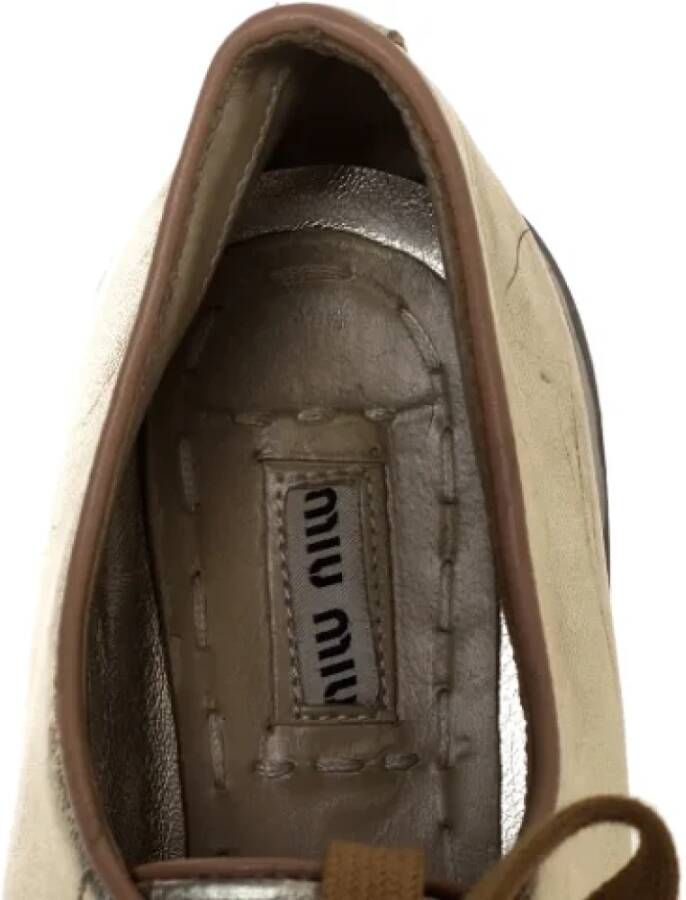 Miu Pre-owned Leather sneakers Yellow Dames