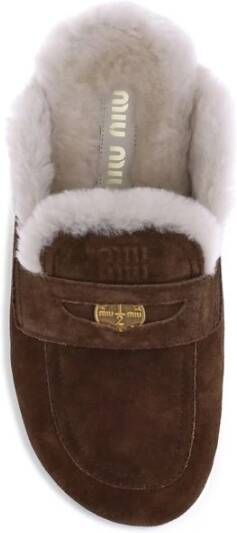 Miu Shearling Muiltjes met leren Horsebit Tray