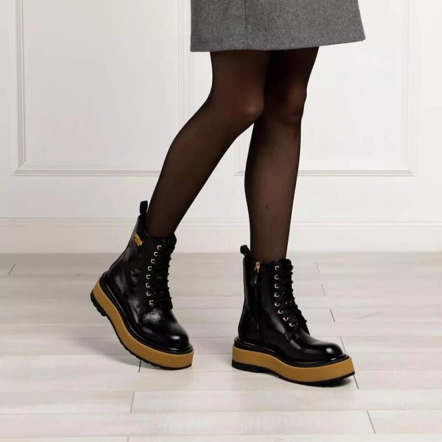 Moschino Enkellaarsjes van zwart leer met vintage-look Black Dames