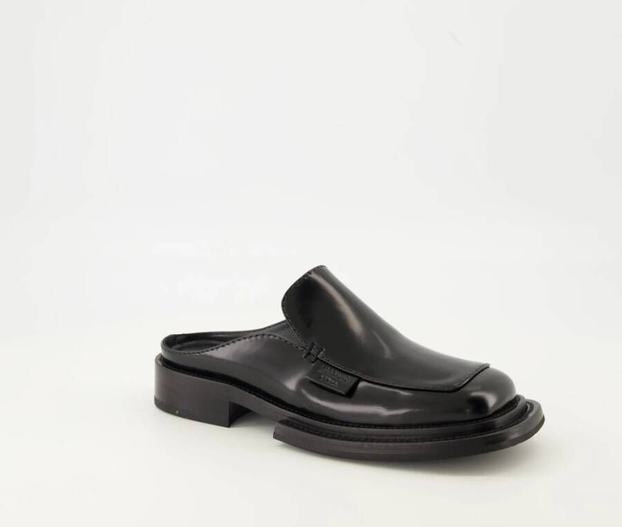 Moschino Leren Muiltjes Elegant en Comfortabel