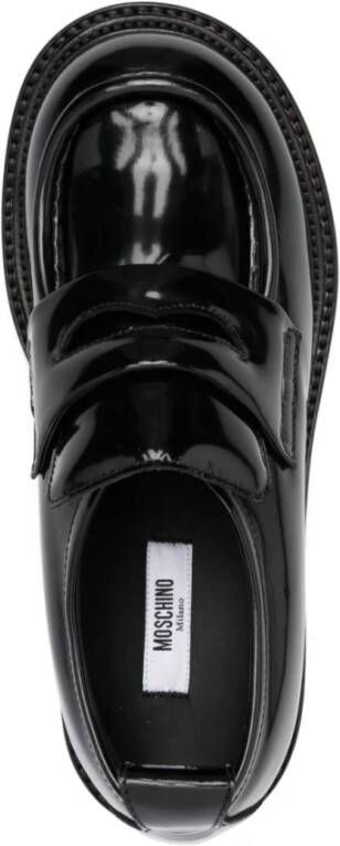 Moschino Zwarte leren platte schoenen