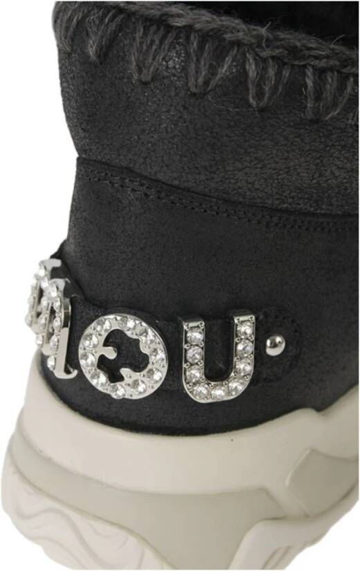 Mou Zwarte platte schoenen met wollen details