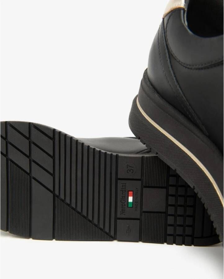 Nerogiardini Zwarte leren sneakers met ritssluiting
