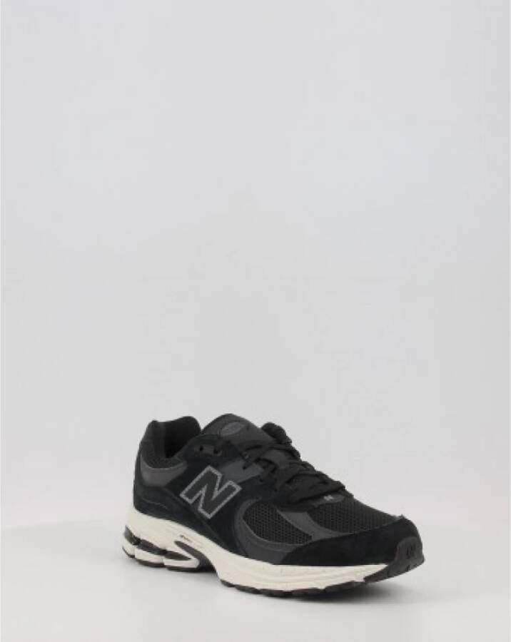 New Balance Zwarte Sneakers met platte zool en veters Zwart Dames