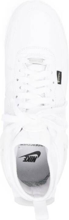 Nike Witte Leren Sneakers met Iconisch Logo Wit Dames