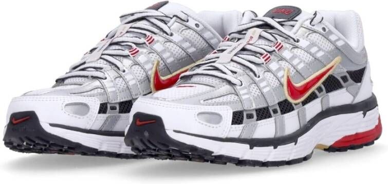 Nike Witte lage schoen met rode details White Dames