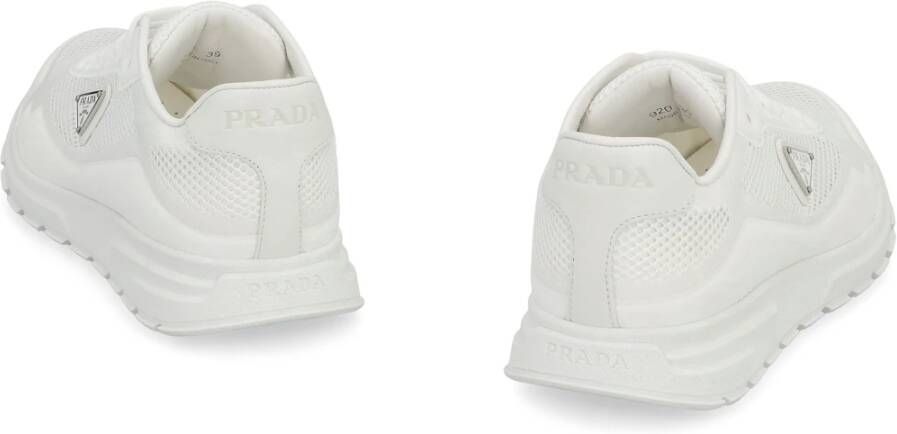 Prada Stoffen lage sneakers met metalen logo