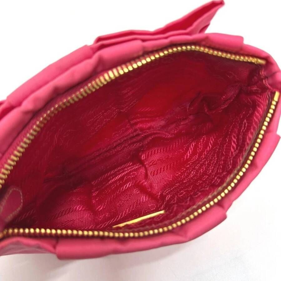 Prada Vintage Tweedehands Elegante Boog Accent Pouch met Polsband voor Speciale Gelegenheden