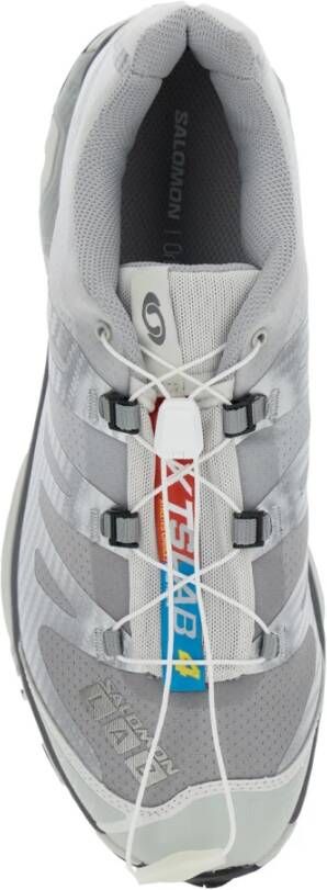 Salomon Grijze lage top sneakers met zilveren accenten